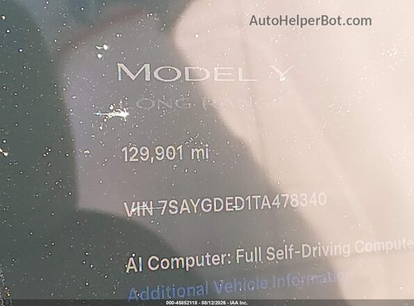 7SAYGDED1TA478340 2026 TESLA MODEL Y Gray Vista interior trasera