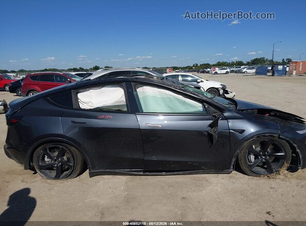 7SAYGDED1TA478340 2026 TESLA MODEL Y Gray Vista del salpicadero