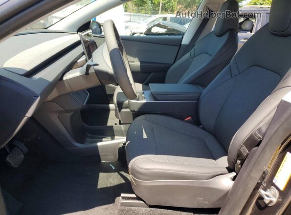 7SAYGDED1TA590068 2026 TESLA MODEL Charcoal Вид салону спереду