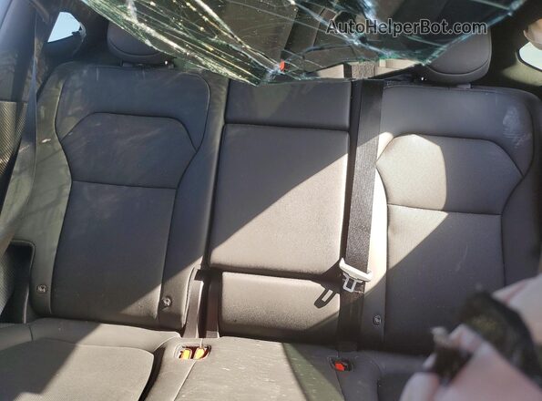 7SAYGDED1TA704277 2026 TESLA MODEL Charcoal Vista de los asientos traseros
