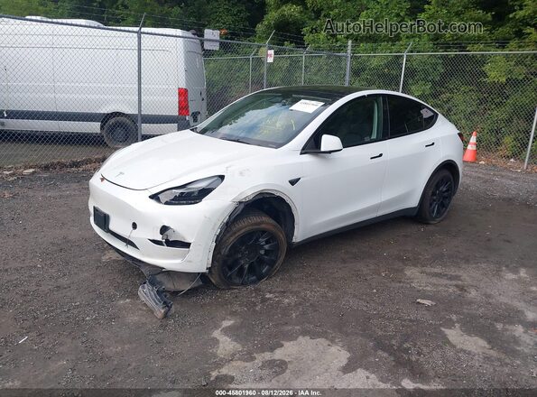 7SAYGDED2PF940316 2023 TESLA MODEL Y White წინა მარცხენა ხედი სამი მეოთხედიდან