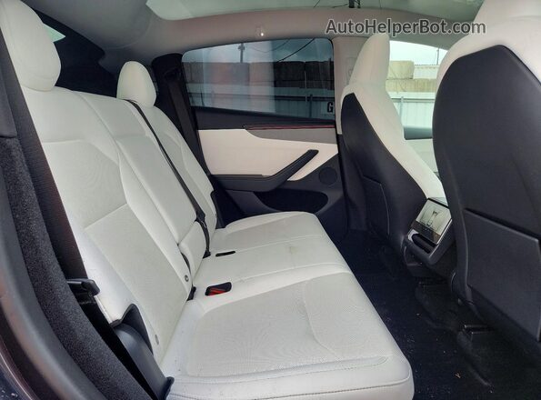 7SAYGDED2TA475124 2026 TESLA MODEL Gray Widok wnętrza z tyłu