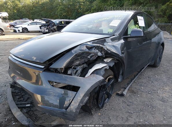 7SAYGDED2TF435807 2026 TESLA MODEL Y Gray წინა მარცხენა ხედი სამი მეოთხედიდან