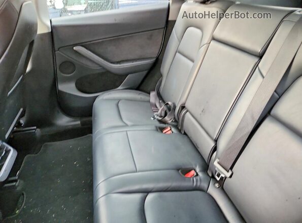 7SAYGDED3RF129160 2024 TESLA MODEL White Rear interior view