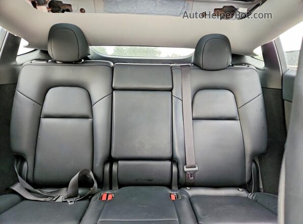 7SAYGDED3RF129160 2024 TESLA MODEL White Rear seats view