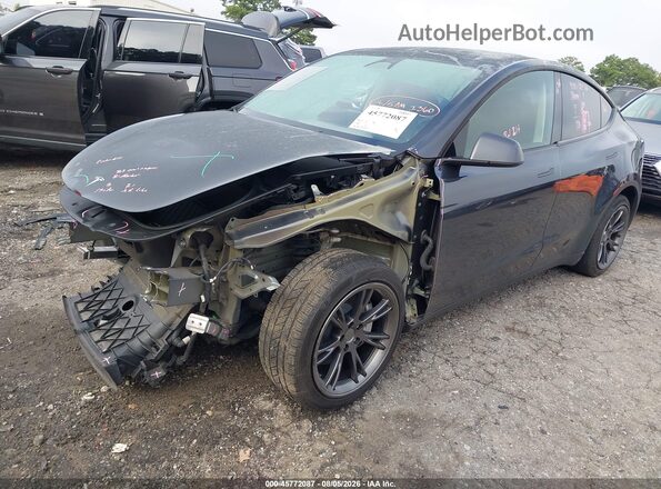 7SAYGDED3SA349403 2025 TESLA MODEL Y Gray Առջևի ձախ երեք քառորդ տեսարան