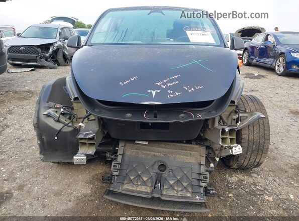 7SAYGDED3SA349403 2025 TESLA MODEL Y Gray Սալոնի հետևի տեսք