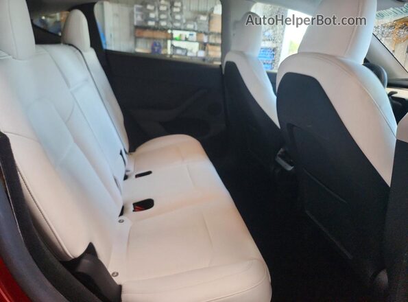7SAYGDED4RF093639 2024 TESLA OTHER Красный Вид задних сидений
