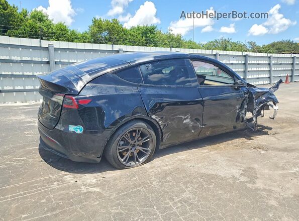 7SAYGDED4RF202522 2024 TESLA MODEL Black Tył prawy
