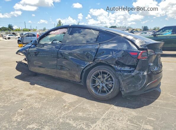 7SAYGDED4RF202522 2024 TESLA MODEL Black Tył lewy