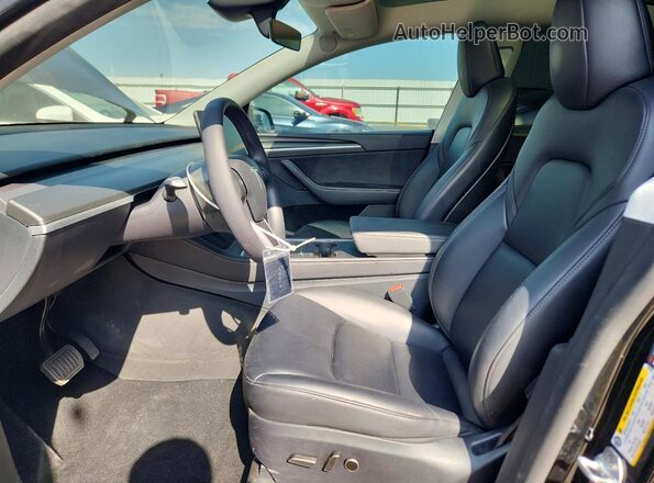 7SAYGDED4SF267876 2025 TESLA MODEL Black Вид салону спереду