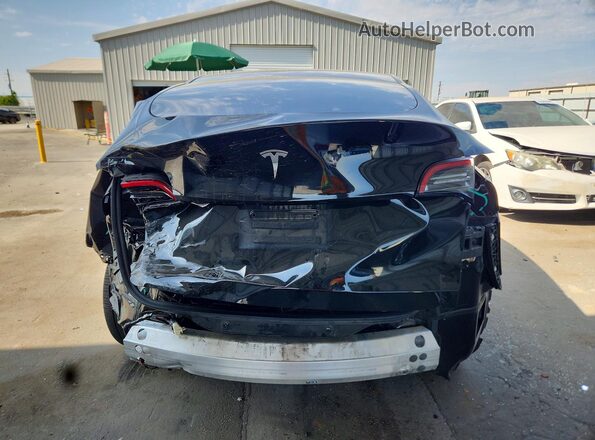 7SAYGDED4SF267876 2025 TESLA MODEL Black Вид ззаду