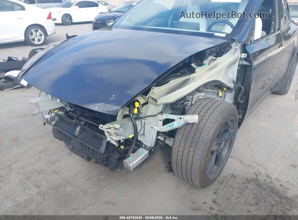 7SAYGDED4TF397979 2026 TESLA MODEL Y Black Front view