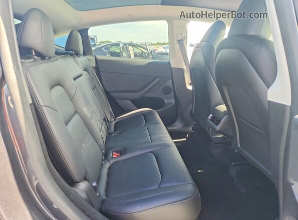 7SAYGDED5SF258877 2025 TESLA MODEL Серый Вид задней части салона