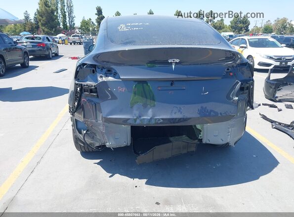 7SAYGDED5SF314090 2025 TESLA MODEL Y Gray Front view
