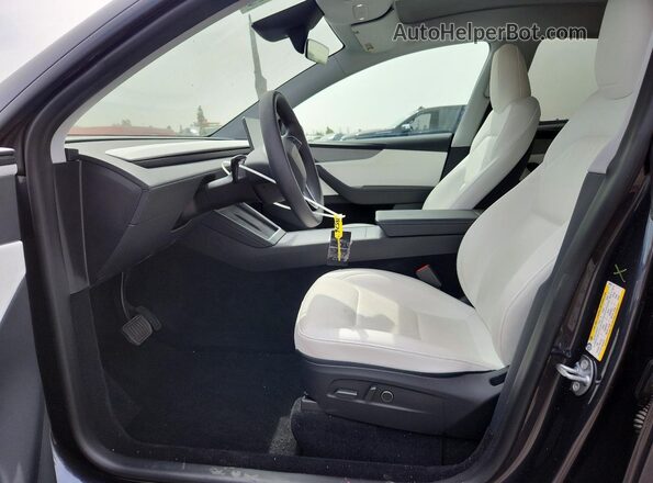 7SAYGDED5TF385971 2026 TESLA MODEL Charcoal Вид салону спереду
