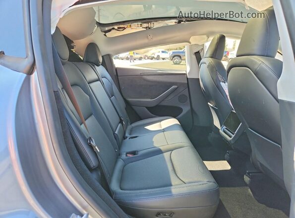 7SAYGDED5TF390975 2026 TESLA MODEL Silver Rear seats view