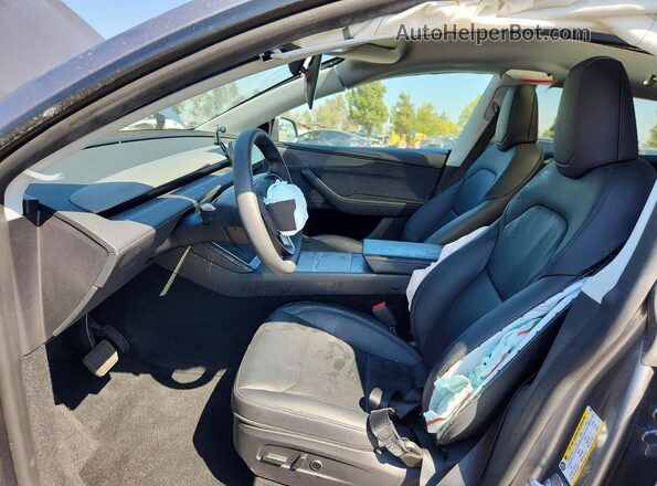 7SAYGDED5TF390975 2026 TESLA MODEL Silver Front interior view