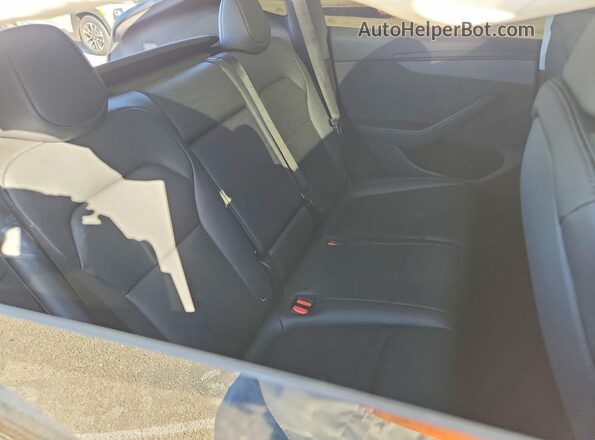 7SAYGDED5TF519314 2026 TESLA MODEL White Rear seats view