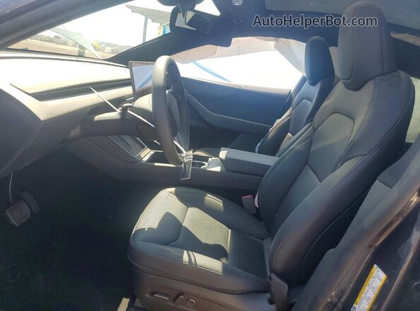 7SAYGDED5TF647083 2026 TESLA MODEL Charcoal Widok wnętrza z przodu