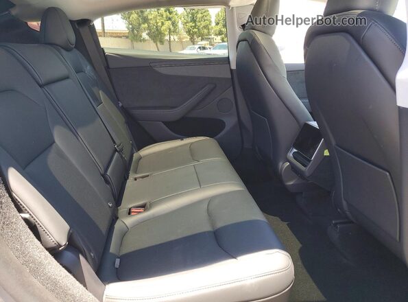 7SAYGDED6TF519984 2026 TESLA MODEL Silver Vista interior trasera