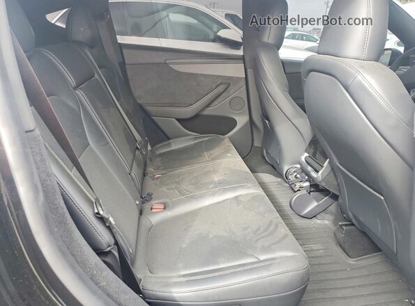 7SAYGDED6TF624590 2026 TESLA MODEL Black უკანა სავარძლების ხედი