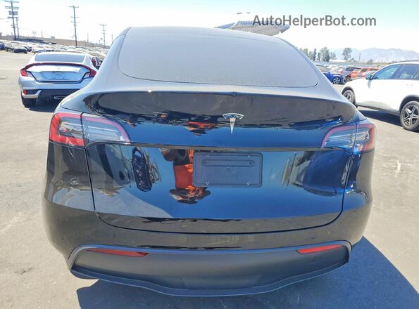 7SAYGDED7RF103161 2024 TESLA MODEL Black Հետևի տեսք