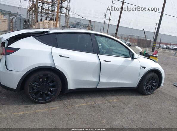 7SAYGDED7SF312941 2025 TESLA MODEL Y Белый Вид панели приборов