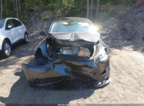 7SAYGDED8RF151154 2024 TESLA MODEL Y Черный Вид задней части салона