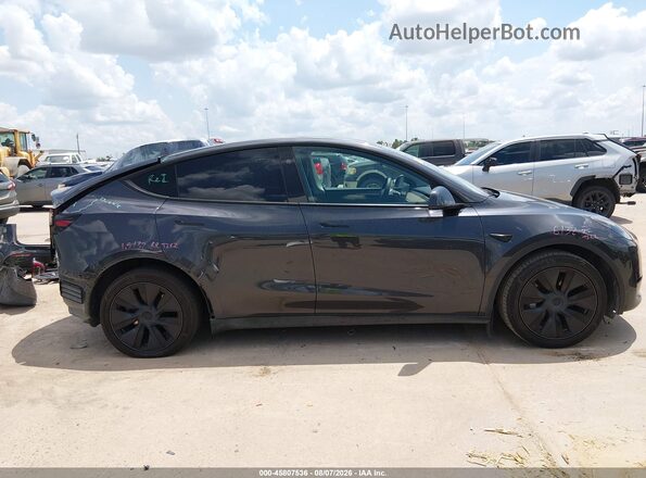 7SAYGDED8SF259568 2025 TESLA MODEL Y Серый Вид задней части салона
