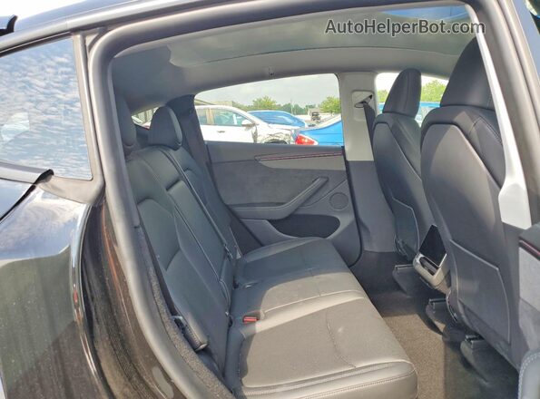 7SAYGDED8TF420809 2026 TESLA MODEL Black Widok wnętrza z tyłu