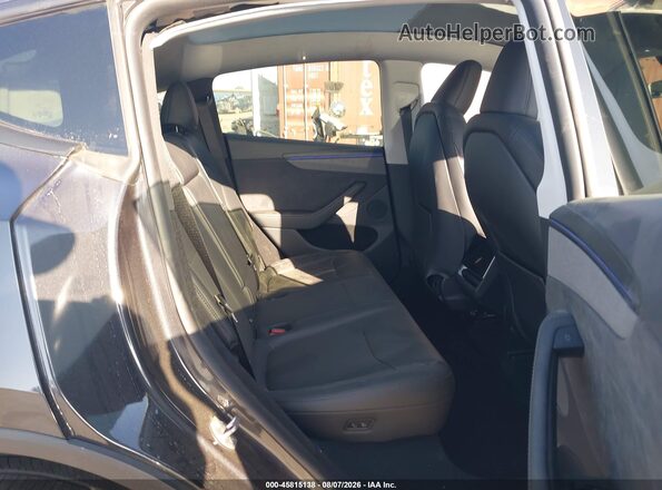 7SAYGDED8TF562108 2026 TESLA MODEL Y Black VIN կոդի պիտակի տեսք