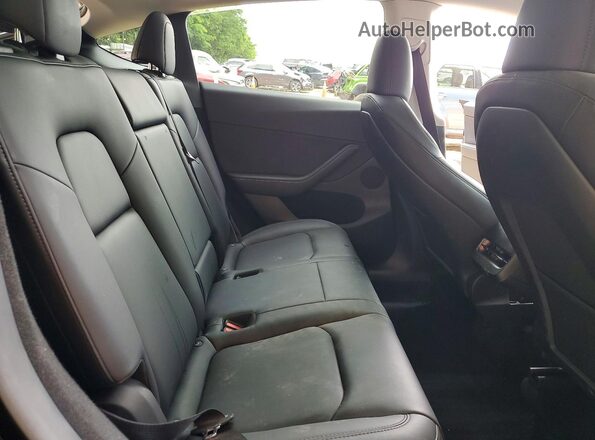 7SAYGDED9RF050897 2024 TESLA MODEL Black Widok tylnych siedzeń