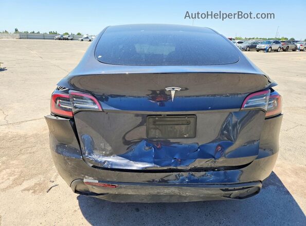 7SAYGDED9RF111519 2024 TESLA MODEL Charcoal Rear view