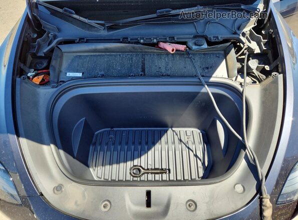 7SAYGDED9RF111519 2024 TESLA MODEL Charcoal Rear interior view