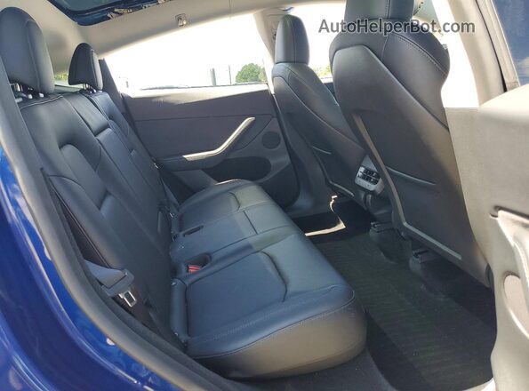 7SAYGDED9RF158114 2024 TESLA MODEL Blue Vista de los asientos traseros