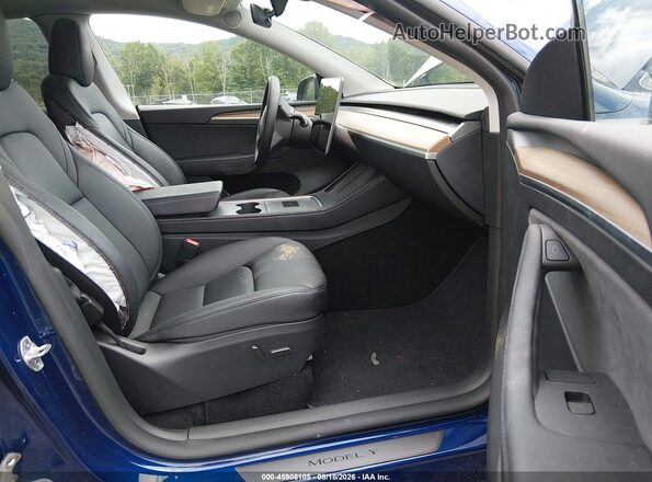 7SAYGDED9RF162888 2024 TESLA MODEL Y Blue Widok wnętrza z przodu
