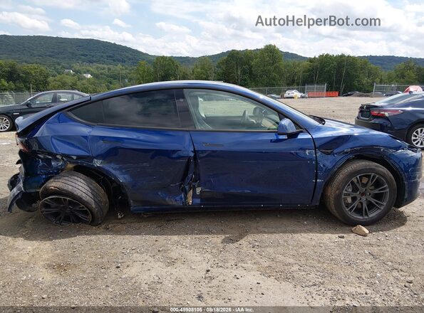 7SAYGDED9RF162888 2024 TESLA MODEL Y Blue Widok wnętrza z tyłu