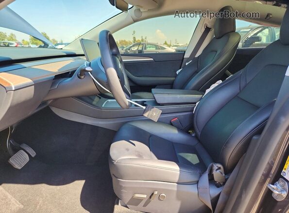 7SAYGDED9SF250524 2025 TESLA MODEL Серый Вид салона спереди