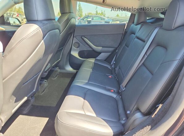 7SAYGDED9SF250524 2025 TESLA MODEL Серый Вид задней части салона