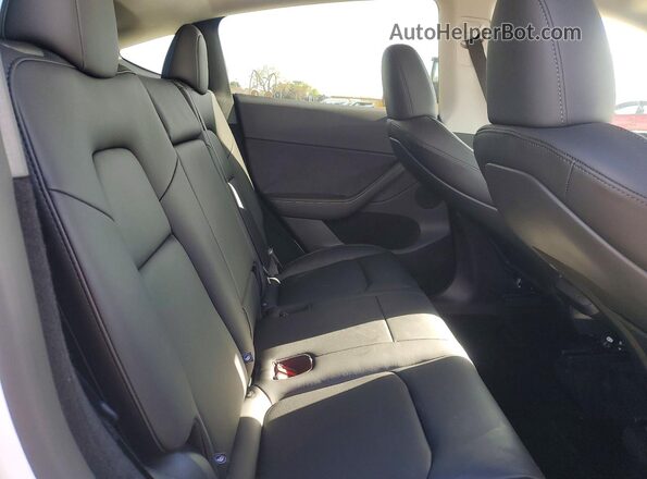 7SAYGDED9SF321592 2025 TESLA MODEL Белый Вид задней части салона