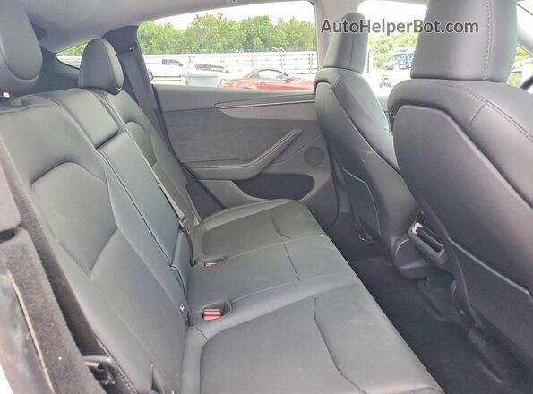 7SAYGDED9TA500973 2026 TESLA MODEL White Вид задніх сидінь