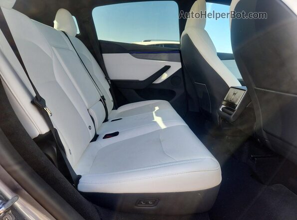 7SAYGDED9TA719710 2026 TESLA MODEL Charcoal Rear interior view