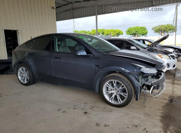 7SAYGDEDXPF944114 2023 TESLA MODEL Черный Передняя правая четверть
