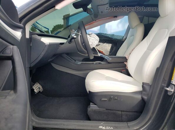 7SAYGDEDXRF052612 2024 TESLA MODEL Угольный Вид салона спереди
