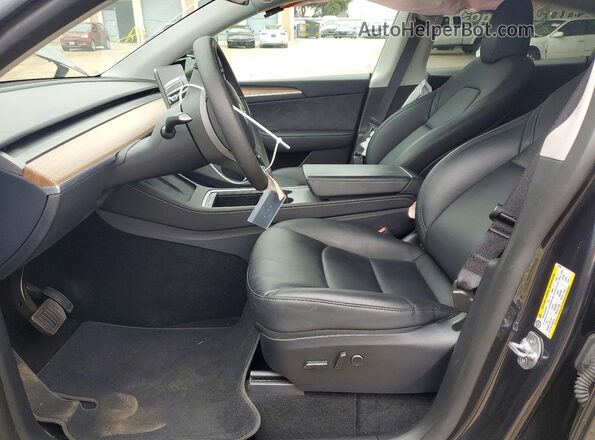 7SAYGDEDXRF057938 2024 TESLA MODEL Серый Вид салона спереди