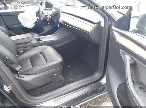 7SAYGDEDXSF260513 2025 TESLA MODEL Y Gray Вид салону спереду