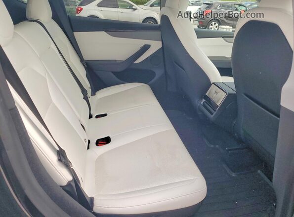7SAYGDEDXTF437983 2026 TESLA MODEL Charcoal უკანა სავარძლების ხედი