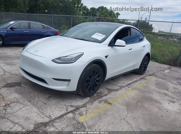 7SAYGDEE0PA024918 2023 TESLA MODEL Y White წინა მარცხენა ხედი სამი მეოთხედიდან