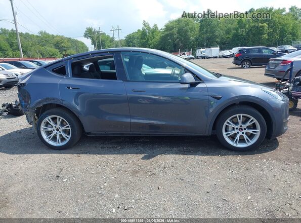 7SAYGDEE0PA045171 2023 TESLA MODEL Y Серый Вид задней части салона